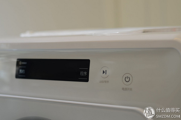 洗衣机在使用过程中怎么把门开开,洗衣机怎么先把门打开