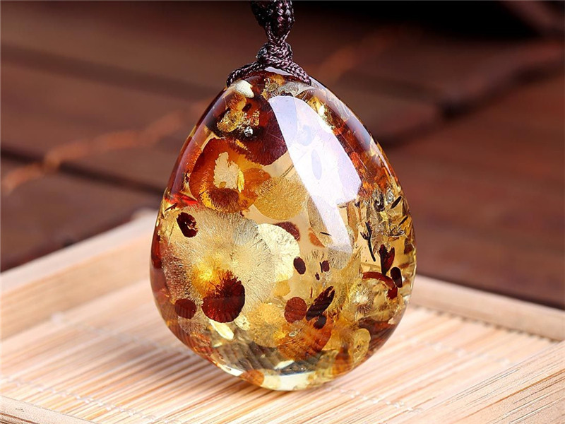 花珀人工爆花可以过检吗,人工爆花的花珀是假的吗