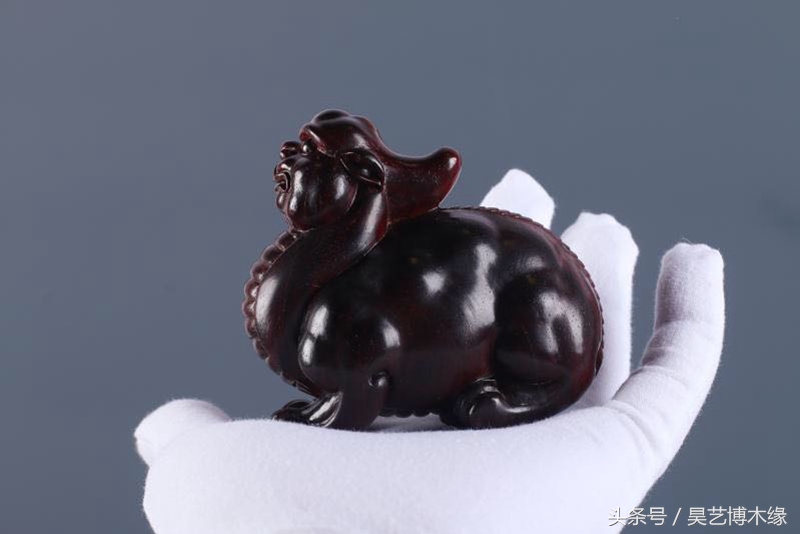 手把件是饰品吗,木制手玩把件