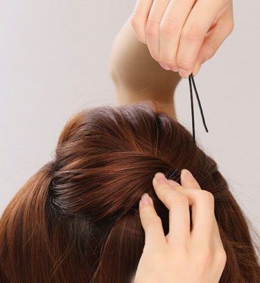 扎头发花苞头教程图解,花苞头的简单扎法蓬松中长发