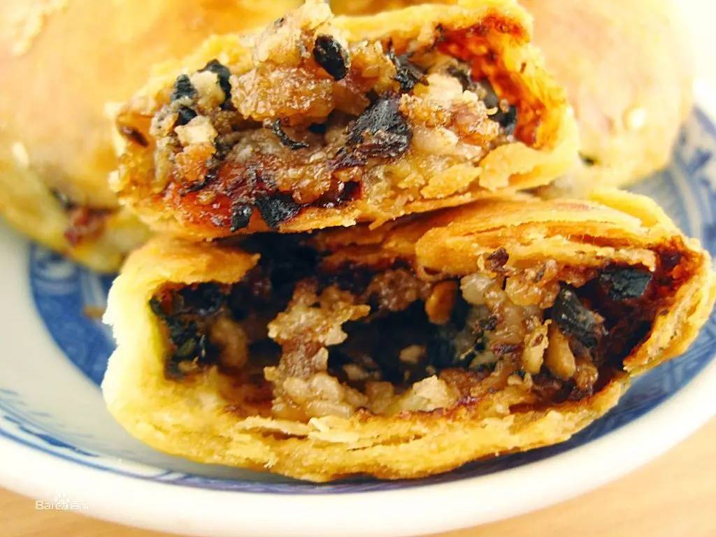 安徽黄山特点美食年糕,黄山西格玛腊味美食