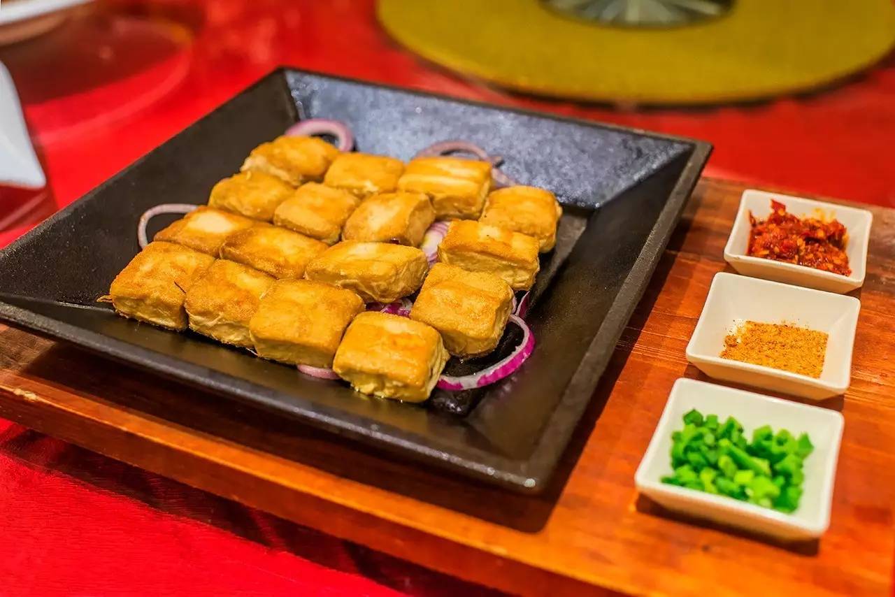 安徽黄山特点美食年糕,黄山西格玛腊味美食