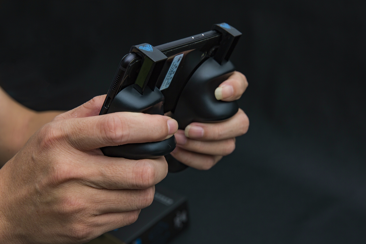 手机游戏和掌上游戏的区别,游戏操作感