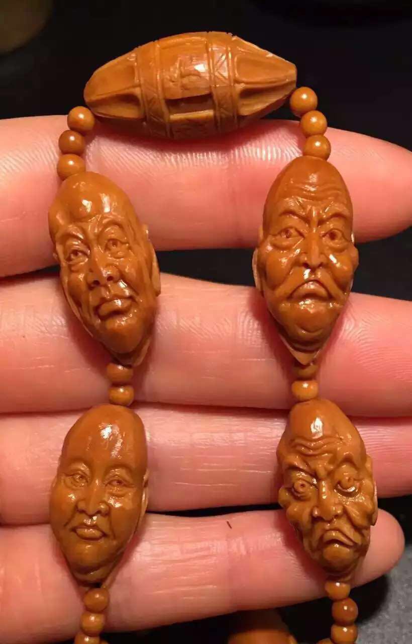文玩橄榄核雕刻手串出售,橄榄核雕刻的文玩怎么盘好看