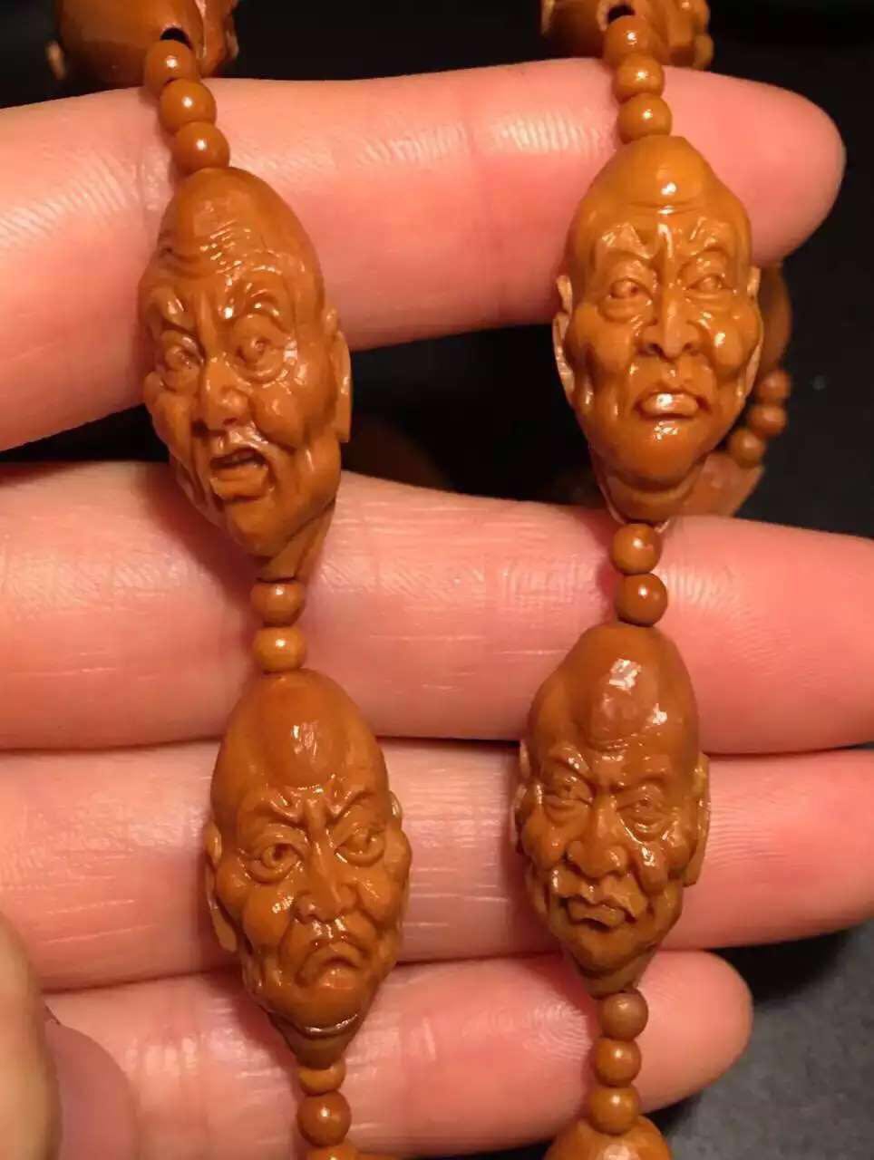 文玩橄榄核雕刻手串出售,橄榄核雕刻的文玩怎么盘好看