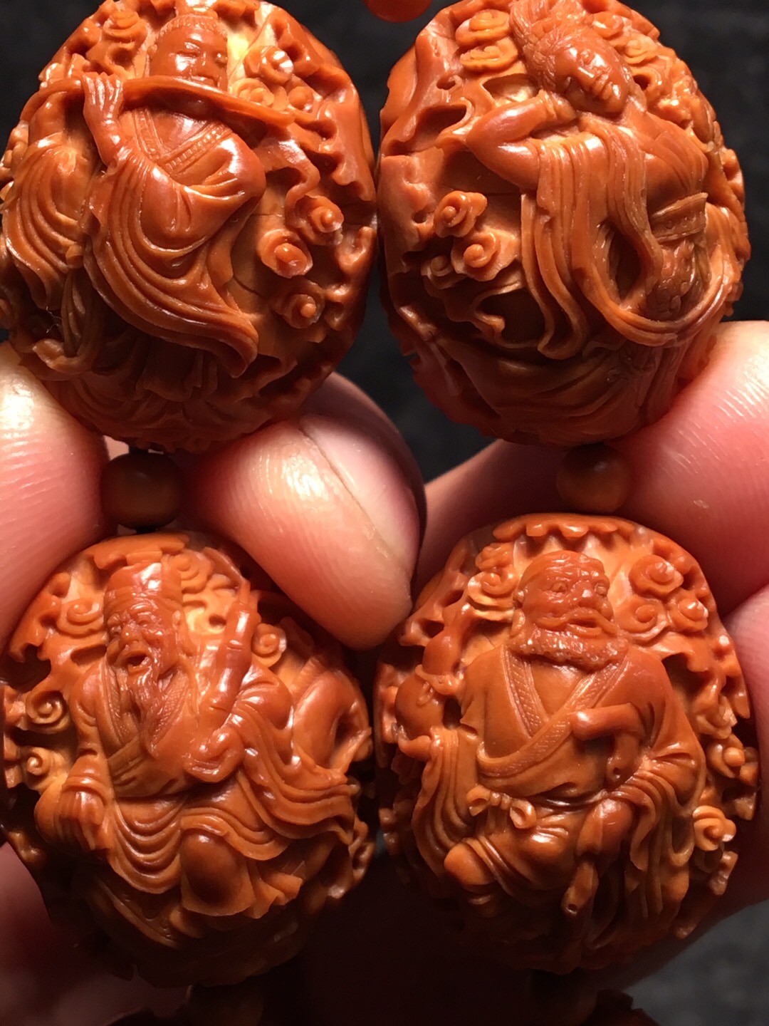 橄榄核雕的作品图片大全,橄榄核雕沈峰作品