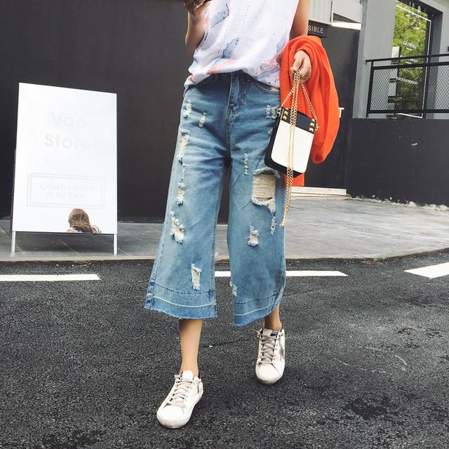 高街破洞牛仔九分裤,美式高街破洞牛仔裤谁穿谁好看