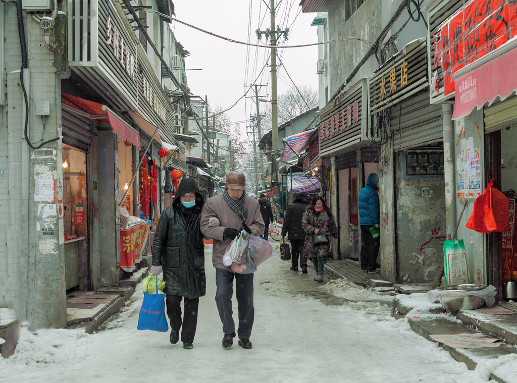 随风飞舞——雪花下武昌街头影像