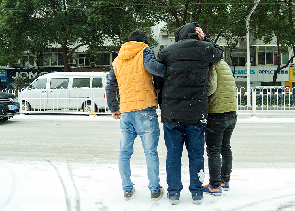 随风飞舞——雪花下武昌街头影像
