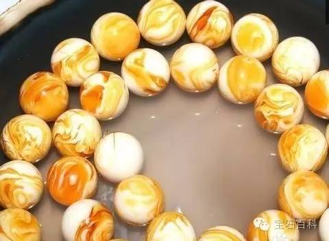 二代蜜蜡属于假货吗,二代蜜蜡反花吗