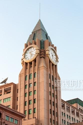 重庆解放碑附近劳力士手表店铺,解放碑上面的劳力士标志