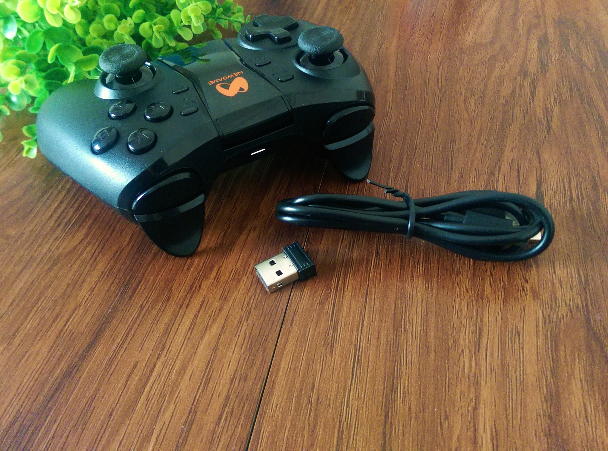 q1游戏手柄怎么样,新游智能游戏手柄q1pro