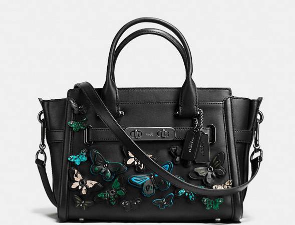 coach一款圆柱形的包,大logo的coach包