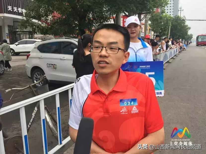 万人空巷见证圣火传递现场！青春的上*党**，豪情飞扬