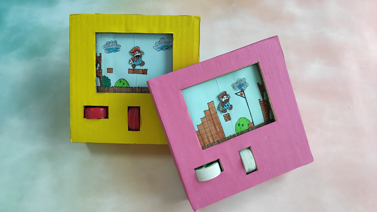 一个快递盒做了一个玩具,一个纸箱做一个游戏机