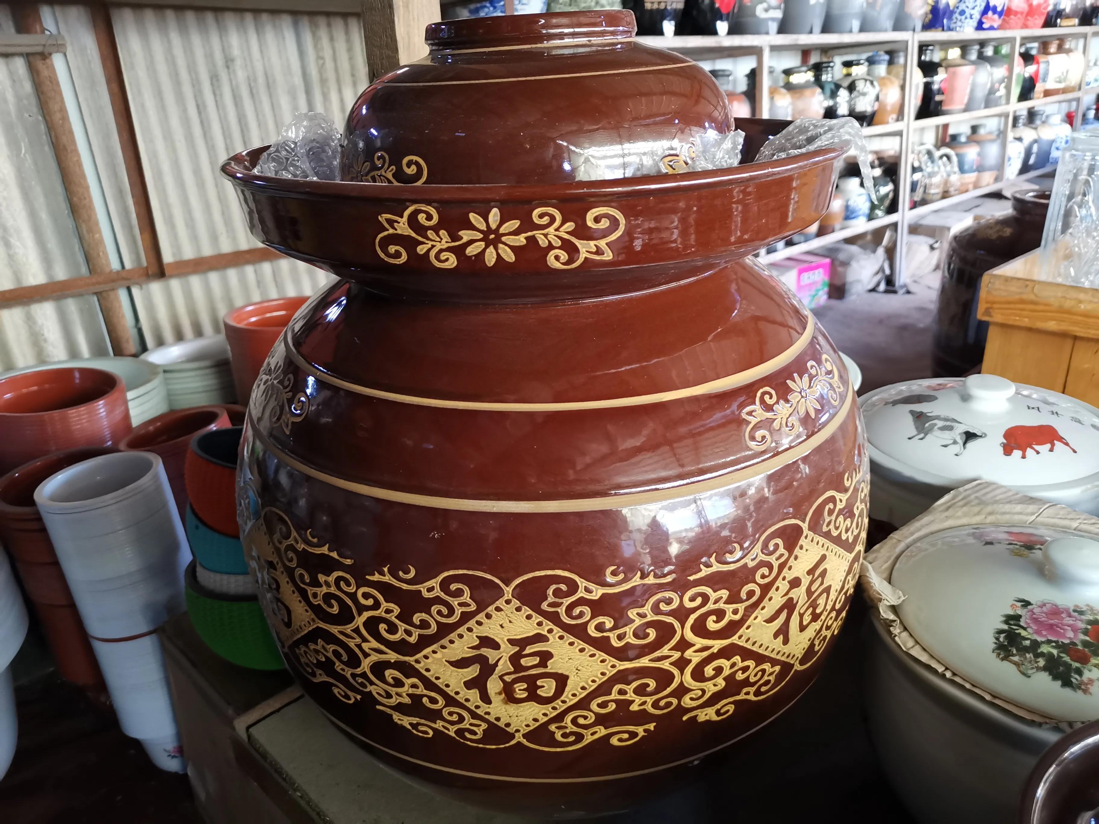 玻璃泡菜坛腌酸菜,泡菜缸里泡老坛酸菜