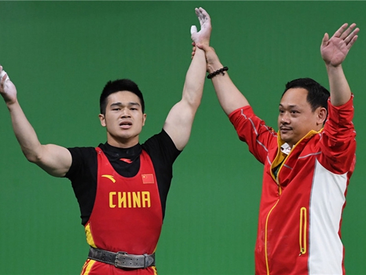 占旭刚2008举重冠军,占旭刚2000年举重央视解说