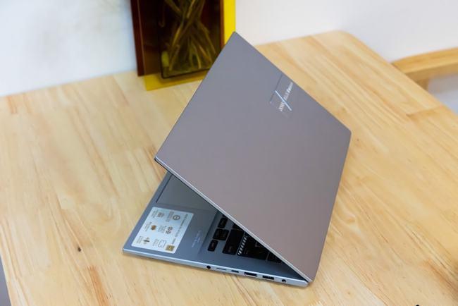 华硕无畏pro14值得买吗塑料感强吗,redmibookpro15和华硕无畏14对比