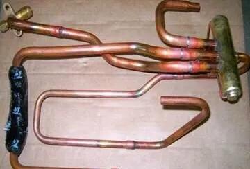 三位四通电磁换向阀的工作原理,电磁四通换向阀的结构及工作原理