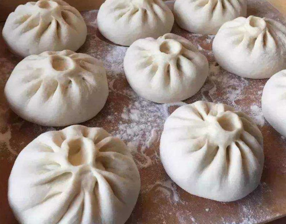 怎么蒸包子不塌陷不回缩,为什么包子出锅后又硬又回缩又黄
