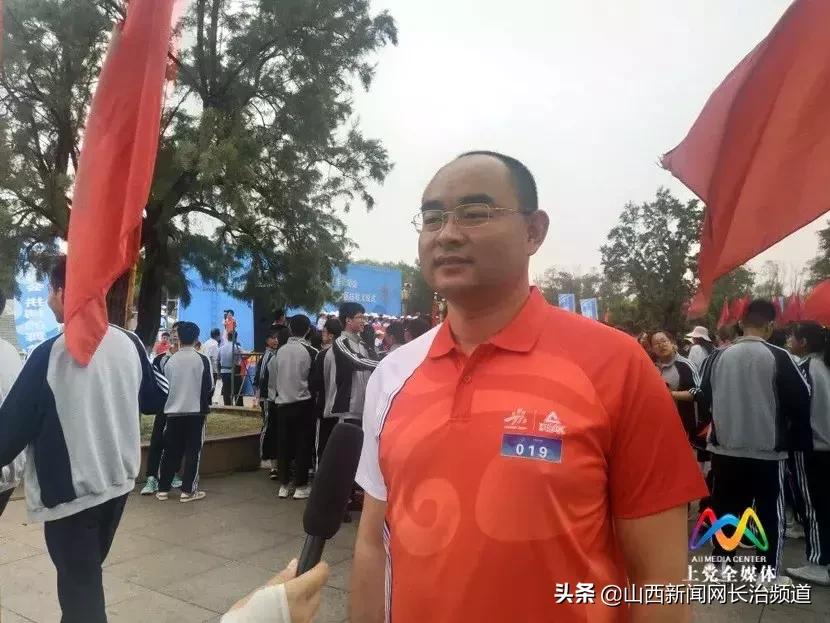 万人空巷见证圣火传递现场！青春的上*党**，豪情飞扬