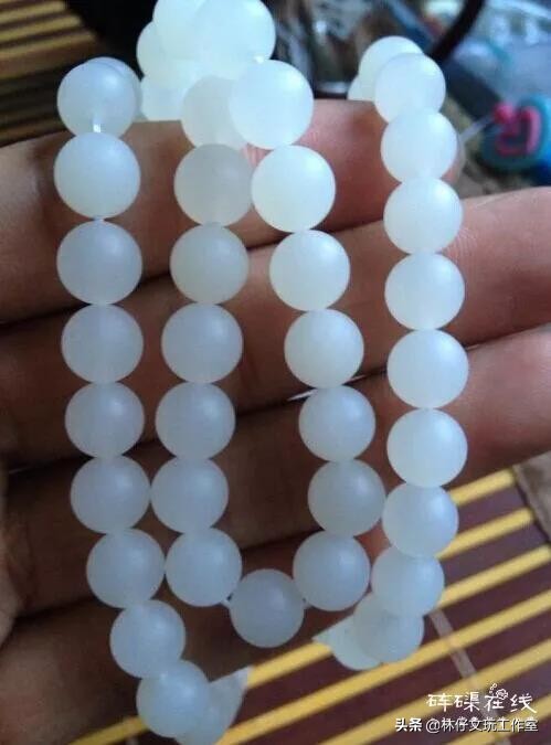 真假金丝砗磲对比照片,紫光灯照白砗磲的真假鉴别