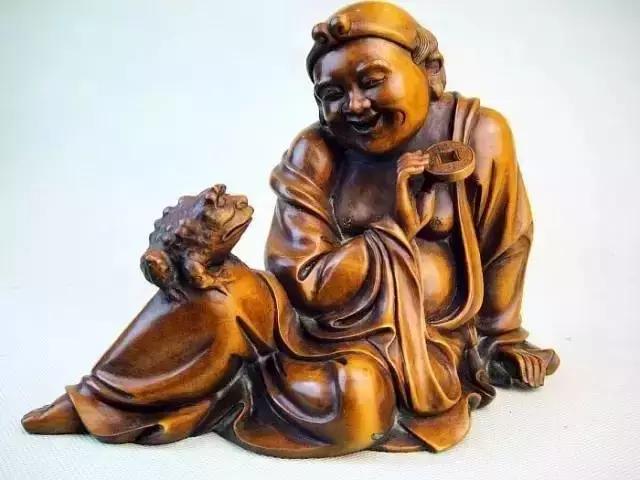 木雕兽头什么寓意,长颈鹿木雕婚礼摆件有什么寓意