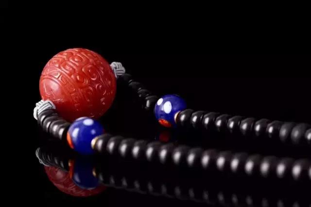 男人戴南红是不是娘,男生戴南红图文