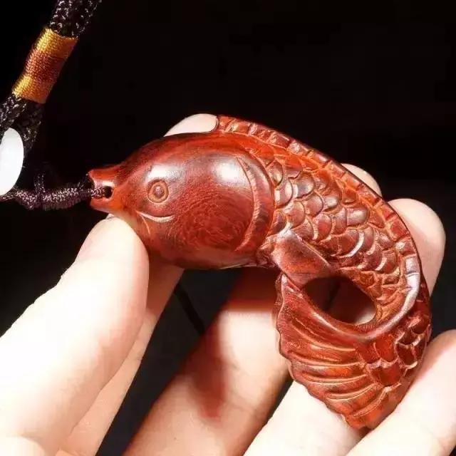 木雕兽头什么寓意,长颈鹿木雕婚礼摆件有什么寓意