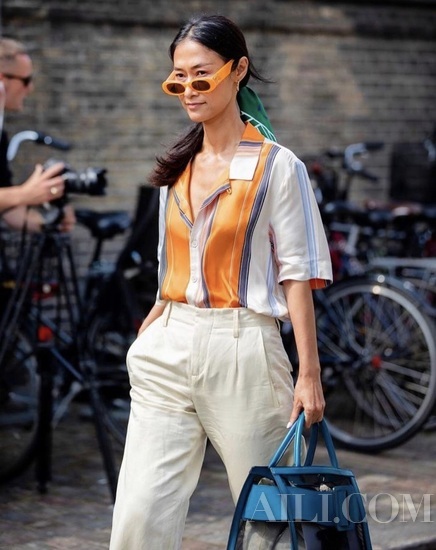 适合黄黑皮的橘色,黄皮适合穿亮橙色