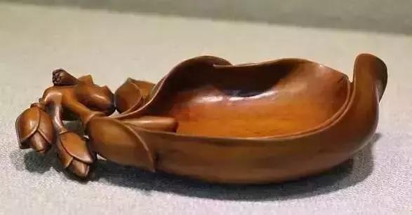 木雕兽头什么寓意,长颈鹿木雕婚礼摆件有什么寓意