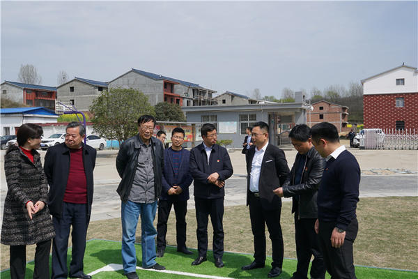 建业集团爱心球场启用仪式在信阳新县举行