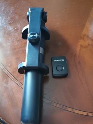 华为三脚架自拍杆af15怎么用,华为有线自拍杆的使用方法及操作