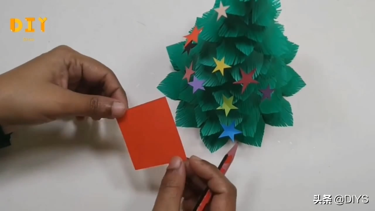手工圣诞树剪纸制作幼儿园,四个圣诞树连在一起剪纸教程