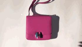 这不是她的书包它是我的英文,这是不是一个包的英语怎么说