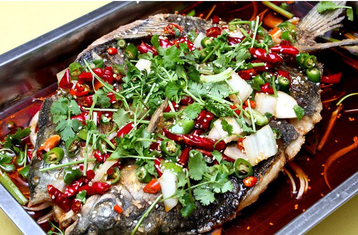 如何制作正宗烤鱼视频讲解,秘制烤鱼的正宗做法及视频