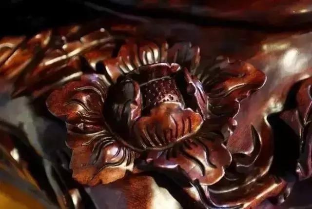 木雕兽头什么寓意,长颈鹿木雕婚礼摆件有什么寓意