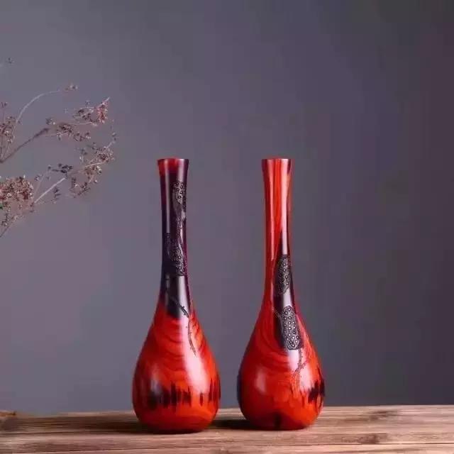 木雕兽头什么寓意,长颈鹿木雕婚礼摆件有什么寓意