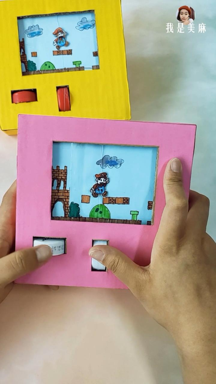 一个快递盒做了一个玩具,一个纸箱做一个游戏机