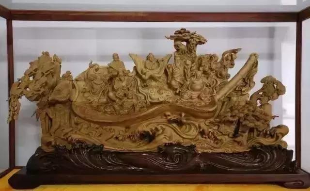 木雕兽头什么寓意,长颈鹿木雕婚礼摆件有什么寓意