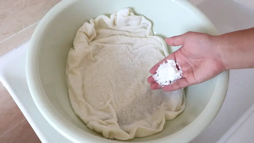 毛巾发粘变硬,为什么毛巾洗完会变硬