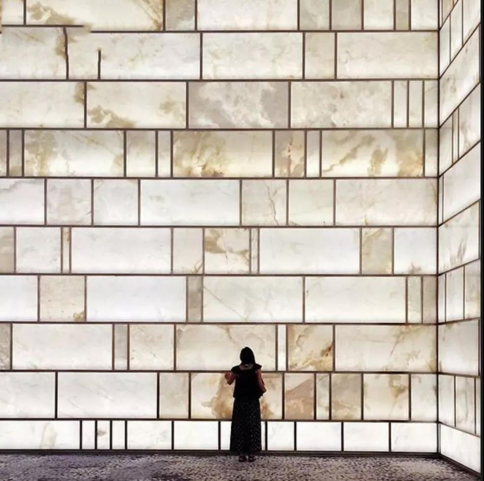 苹果店透光石材工艺,苹果店装修用的什么玻璃