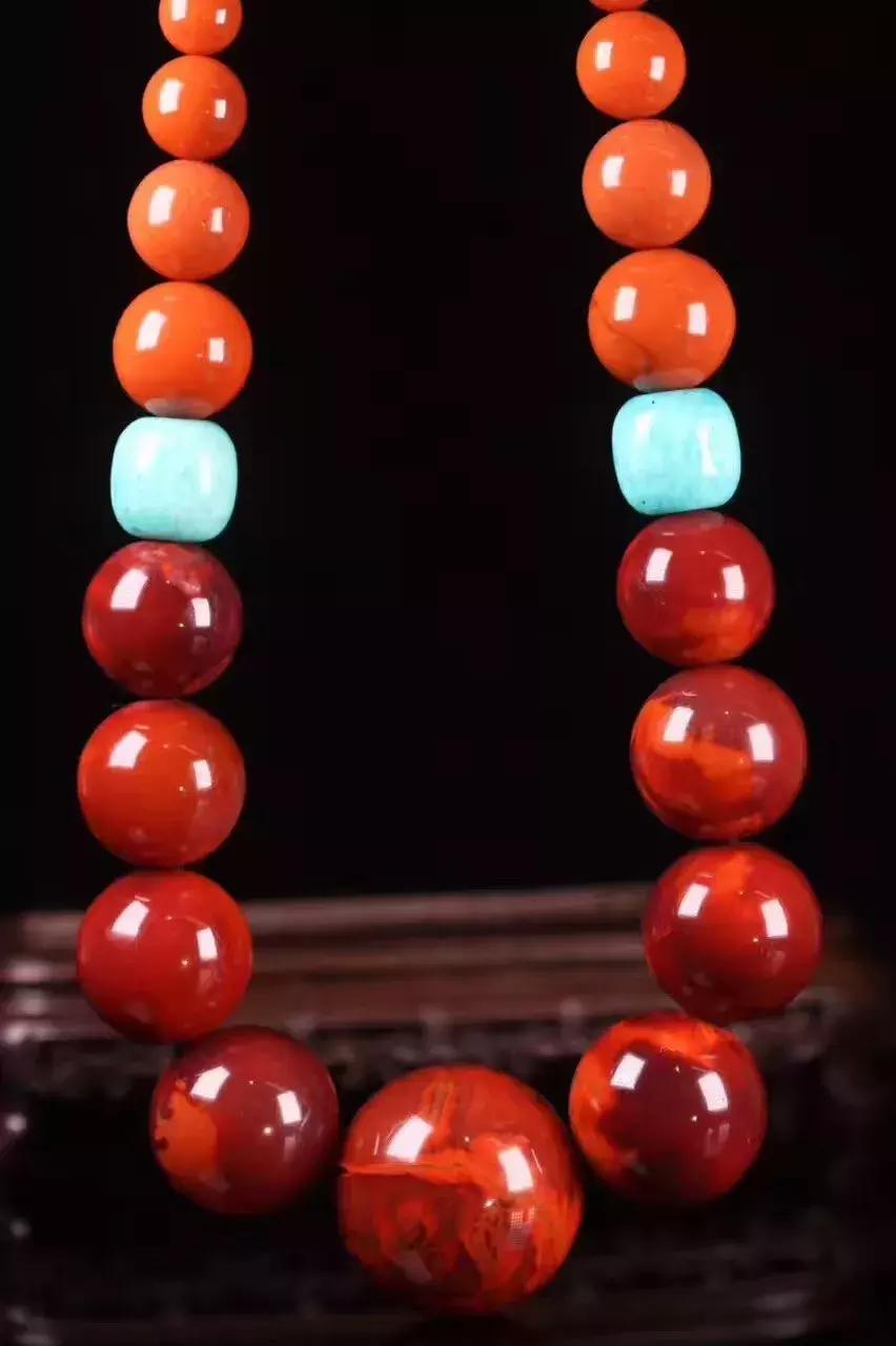 男人戴南红是不是娘,男生戴南红图文