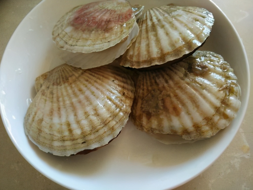 蒜蓉粉丝蒸扇贝做法扇贝怎么处理,已经蒸熟的扇贝能不能做蒜蓉扇贝