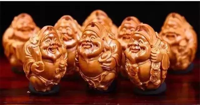 木雕兽头什么寓意,长颈鹿木雕婚礼摆件有什么寓意