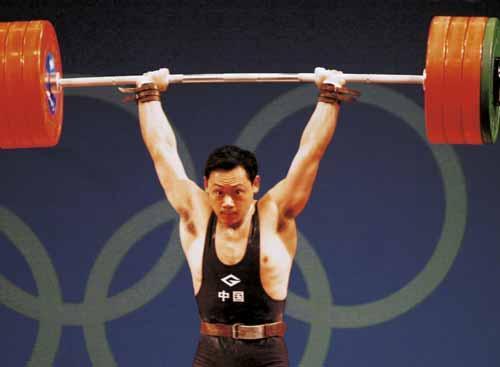 占旭刚2008举重冠军,占旭刚2000年举重央视解说