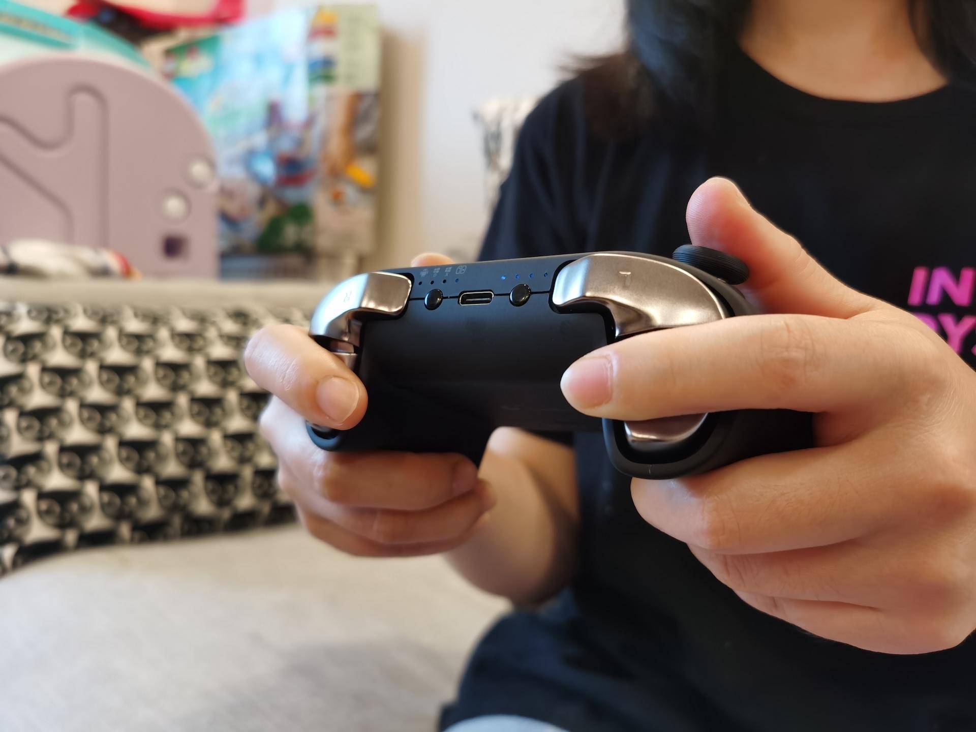 switch手柄对比谷粒金刚手柄,switchpro手柄淘宝200多