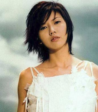 孙燕姿惊艳写真照,孙燕姿海边冲浪